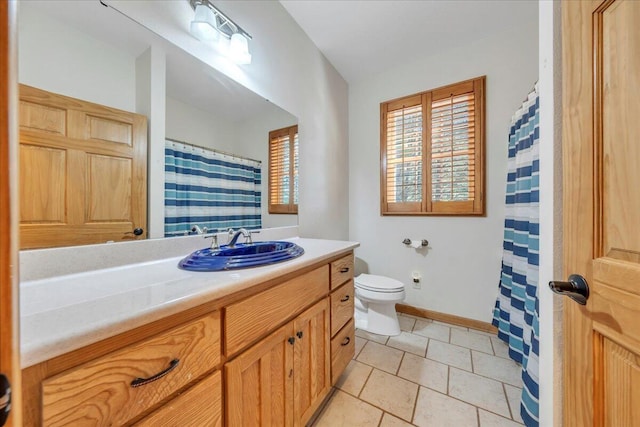 181 Borderline Rd NW, Willis, VA 24380 - full bathroom featuring vanity, toilet, a shower with curtain, and baseboards