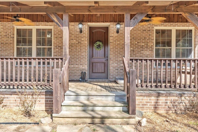 181 Borderline Rd NW, Willis, VA 24380 - entrance to property featuring brick siding, covered porch, and ceiling fan