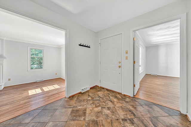 4937 Greenlee Rd SW, Roanoke, VA 24018 - foyer entrance with crown molding and stone finish flooring