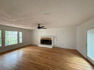 staircase featuring baseboards and stone finish flooring