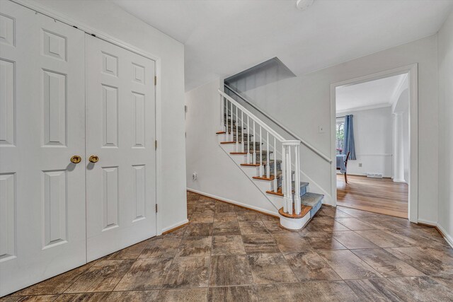 entrance foyer featuring wood finished floors
