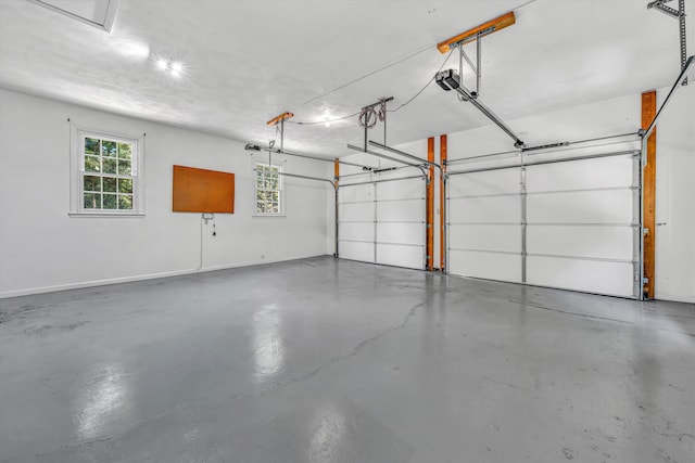 4937 Greenlee Rd SW, Roanoke, VA 24018 - garage with a garage door opener and baseboards