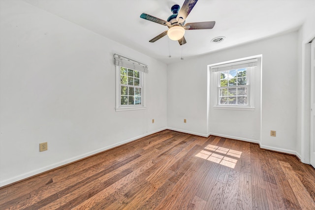 4937 Greenlee Rd SW, Roanoke, VA 24018 - empty room with healthy amount of natural light, wood finished floors, and ceiling fan