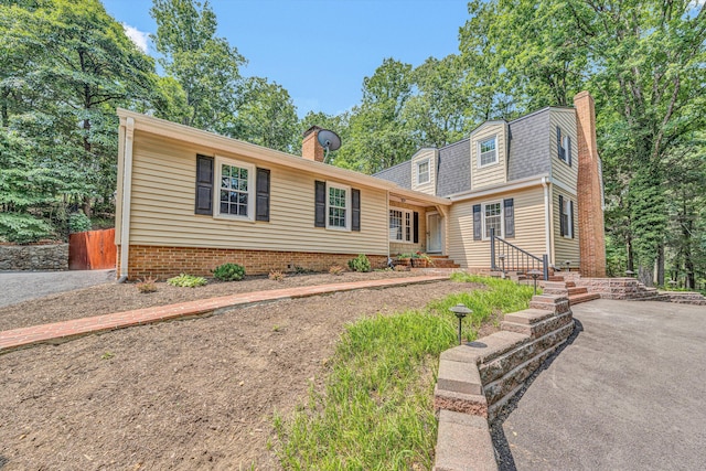 4937 Greenlee Rd SW, Roanoke, VA 24018 - colonial inspired home with a chimney and entry steps