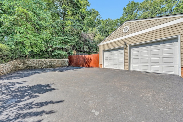 4937 Greenlee Rd SW, Roanoke, VA 24018 - garage featuring asphalt driveway