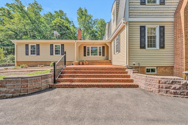 4937 Greenlee Rd SW, Roanoke, VA 24018 - property entrance featuring a chimney