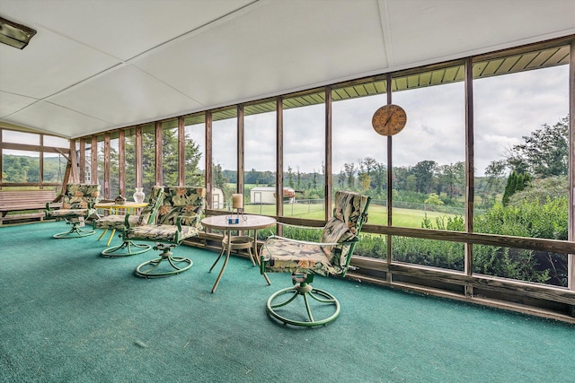 unfurnished sunroom featuring a healthy amount of sunlight