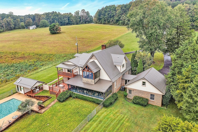 birds eye view of property featuring a rural view