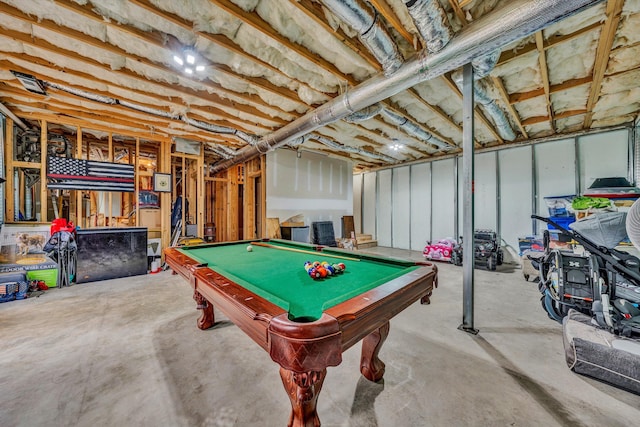 recreation room with pool table and unfinished concrete flooring