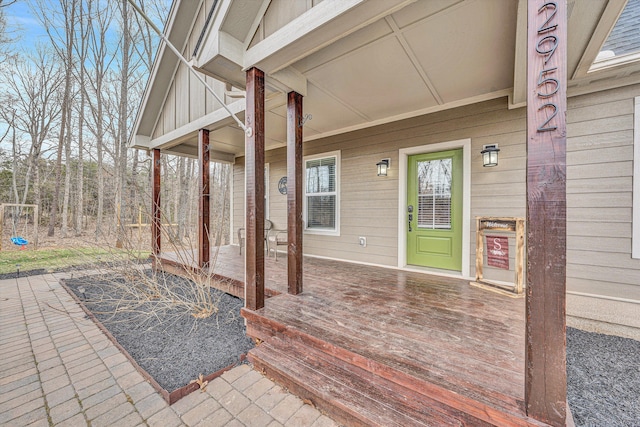 wooden terrace with a porch