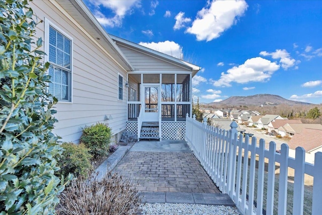 exterior space featuring a mountain view