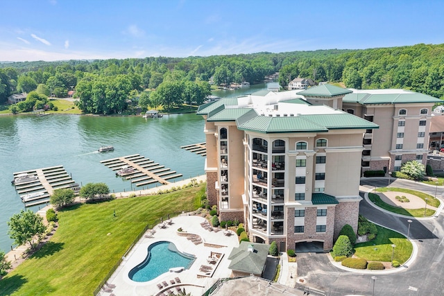 bird's eye view featuring a water view and a forest view