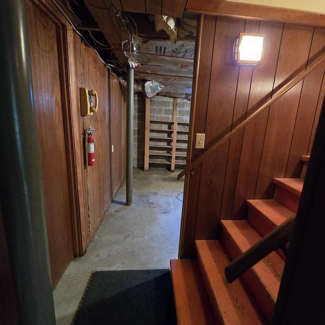 interior space with wooden walls and stairs