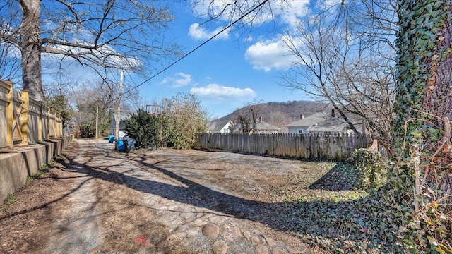 view of yard featuring fence