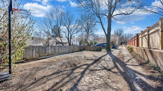 view of yard with fence