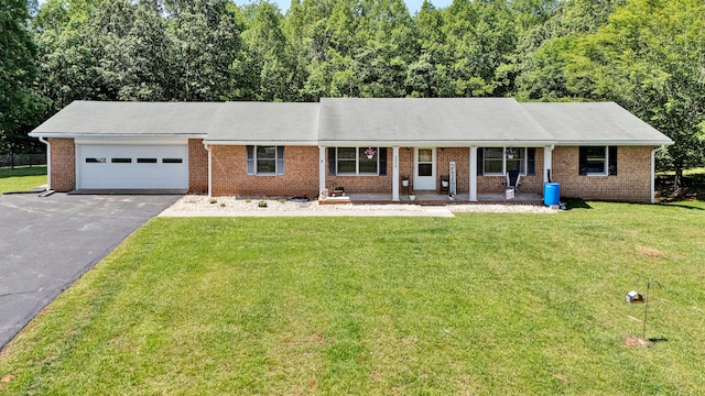 5359 Booker T Washington Hwy, Rocky Mount, VA 24151 - single story home with driveway, a garage, a front yard, and brick siding