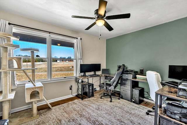 5359 Booker T Washington Hwy, Rocky Mount, VA 24151 - home office featuring ceiling fan, wood finished floors, and baseboards