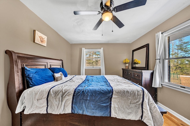 5359 Booker T Washington Hwy, Rocky Mount, VA 24151 - bedroom with baseboards, wood finished floors, and ceiling fan