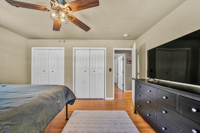 5359 Booker T Washington Hwy, Rocky Mount, VA 24151 - bedroom with multiple closets, light wood finished floors, a ceiling fan, and baseboards