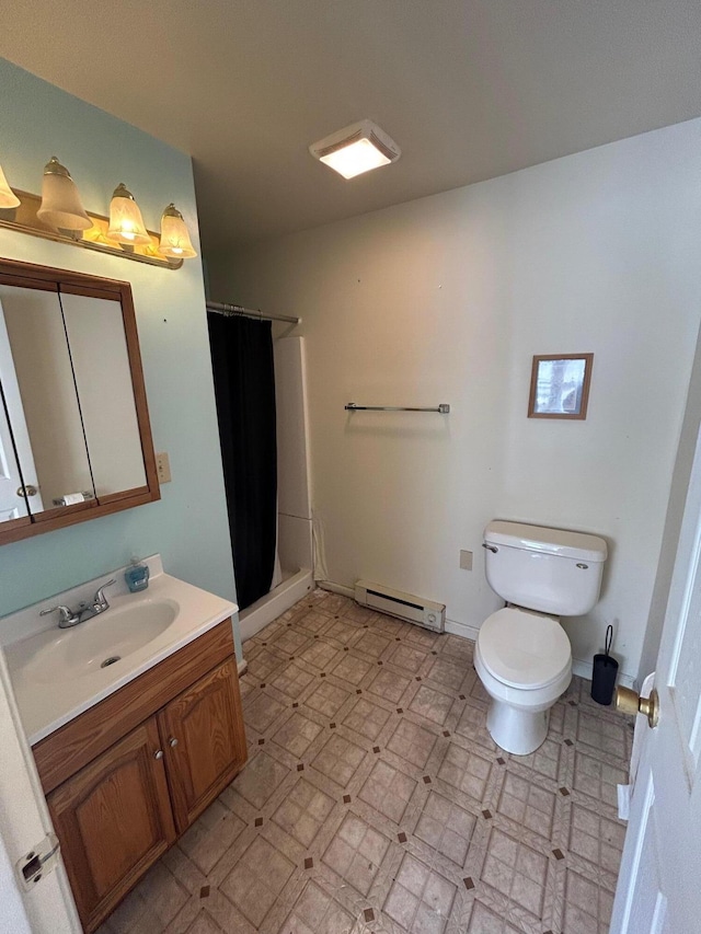 bathroom featuring a stall shower, toilet, tile patterned floors, vanity, and a baseboard heating unit