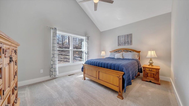 bedroom with high vaulted ceiling, light colored carpet, a ceiling fan, baseboards, and visible vents