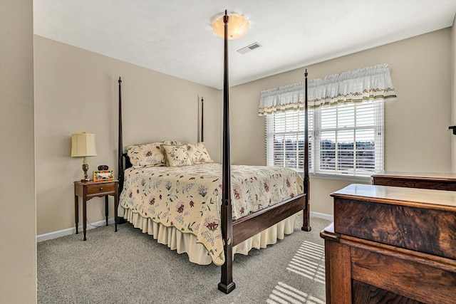 bedroom featuring visible vents, baseboards, and carpet flooring