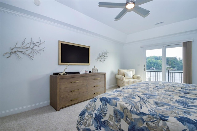 bedroom with baseboards, light colored carpet, visible vents, and access to exterior