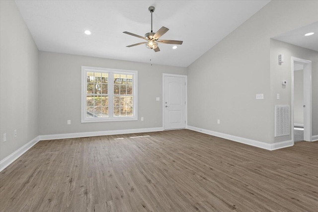 interior space with visible vents, baseboards, recessed lighting, wood finished floors, and a ceiling fan