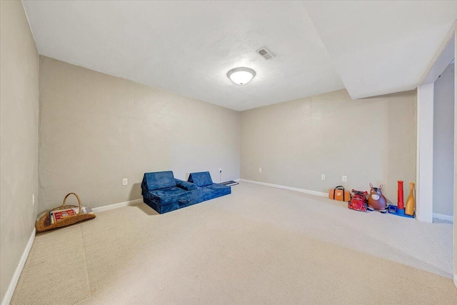 recreation room with baseboards, visible vents, and carpet flooring