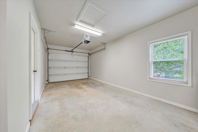 garage featuring baseboards and a garage door opener