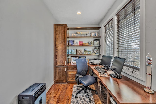 office space with wood finished floors and recessed lighting