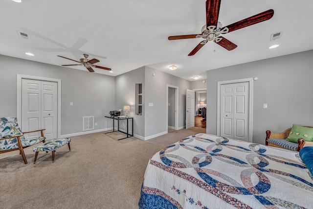 bedroom featuring baseboards, visible vents, and carpet flooring