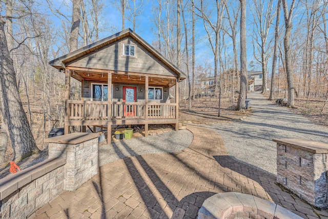 rustic home with covered porch