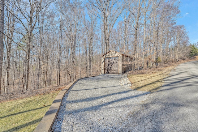 view of street with a wooded view