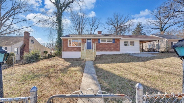 view of front facade with brick siding, a chimney, a front yard, fence private yard, and an attached carport