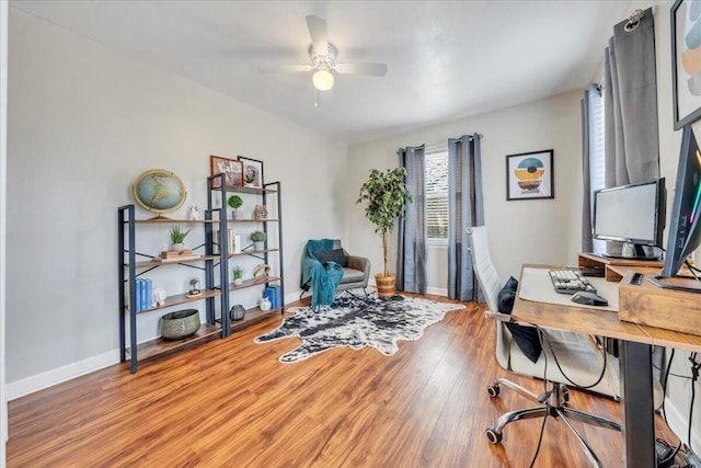 office with ceiling fan, wood finished floors, and baseboards