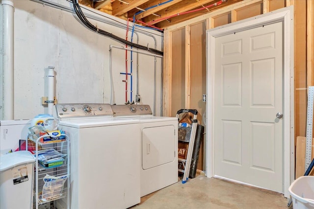 laundry area featuring laundry area and independent washer and dryer