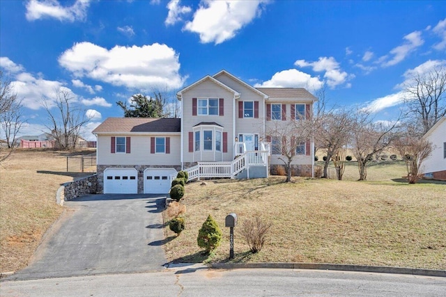 view of front of house with driveway, stone siding, a garage, and a front lawn