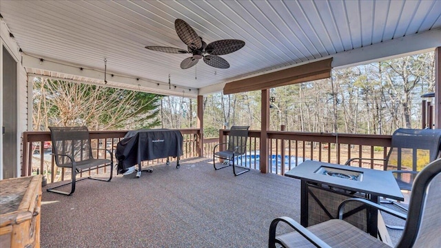 exterior space with a ceiling fan, outdoor dining space, and area for grilling