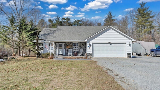 single story home with a front lawn, stone siding, an attached garage, and gravel driveway