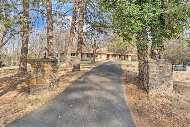 view of front of home featuring aphalt driveway