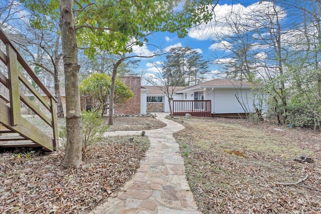 view of yard featuring a deck