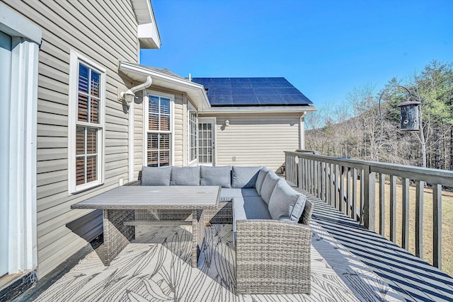 deck with an outdoor living space