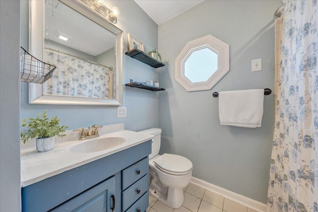 full bathroom featuring tile patterned floors, toilet, curtained shower, baseboards, and vanity