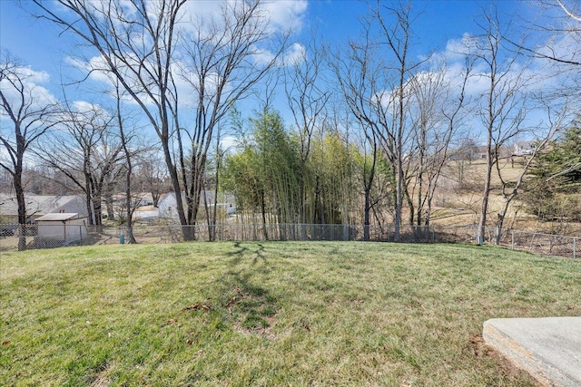 view of yard with fence