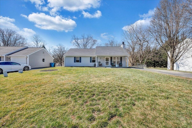 single story home featuring covered porch, a chimney, and a front yard