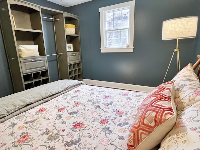 bedroom with baseboards