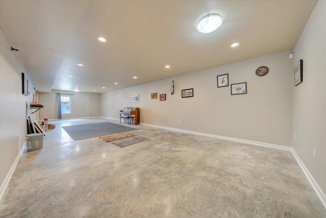 basement with recessed lighting and baseboards