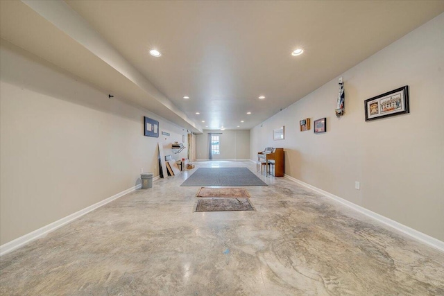 rec room featuring recessed lighting, concrete floors, and baseboards