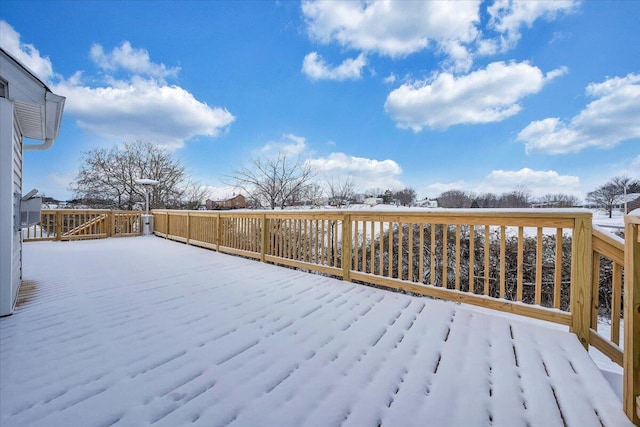 view of snow covered deck